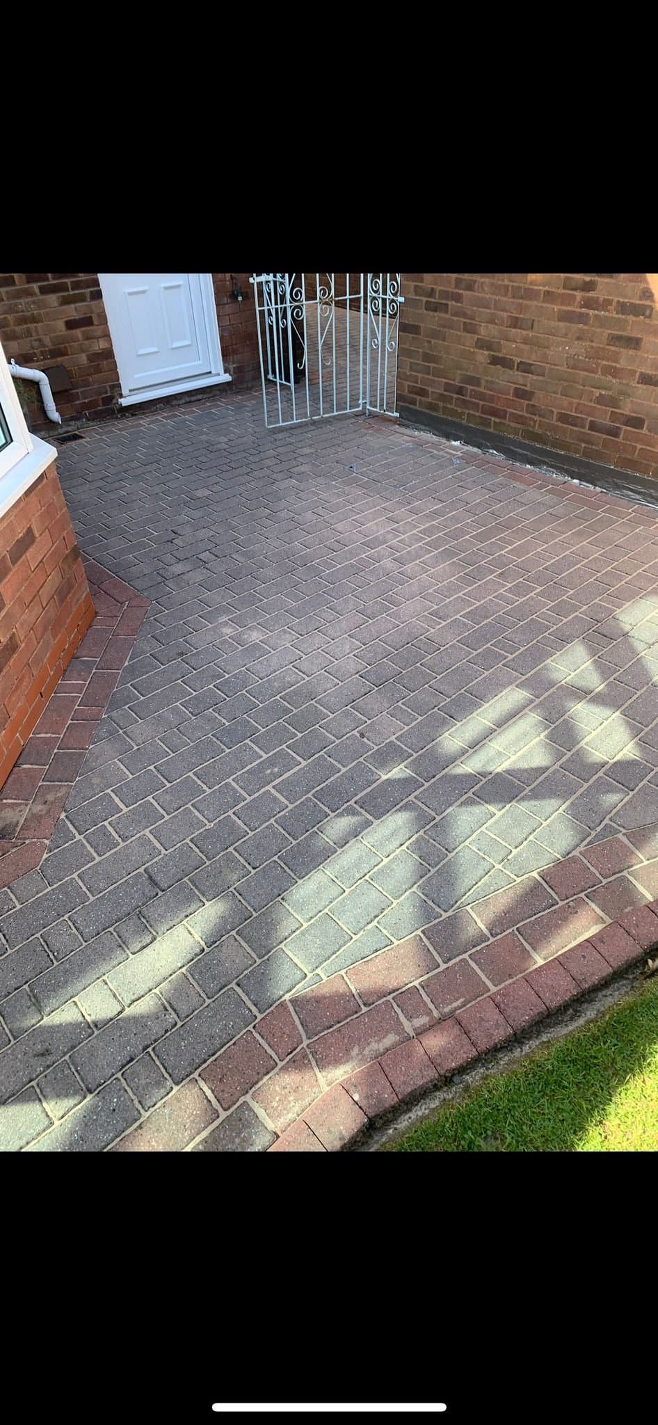 Block paving driveway before cleaning